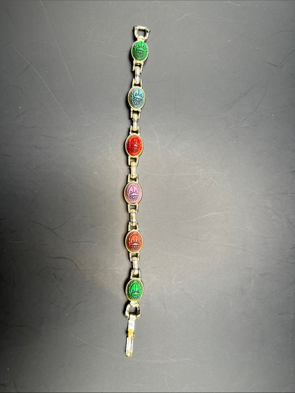 Gold-Tone Bracelet with Multi-colored Carved Scarabs